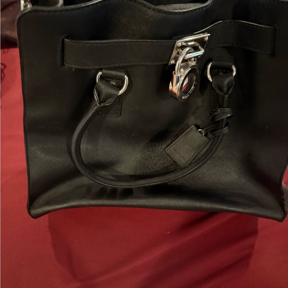 Stylish Black Handbag with Silver Accents
